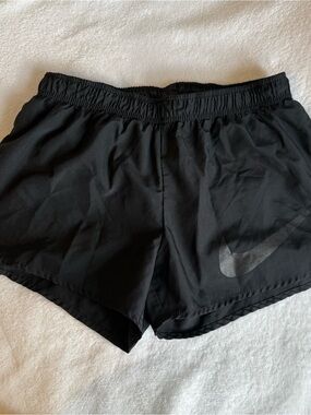 Black Nike running track shorts